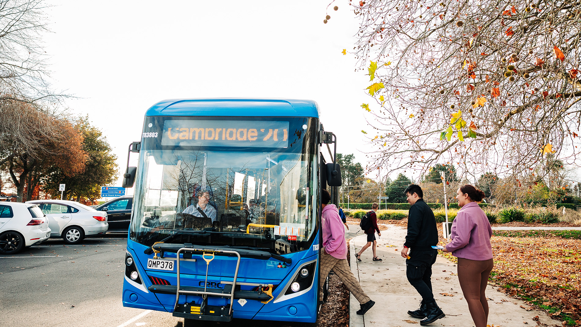 Image of passengers boading the Cambridge bus